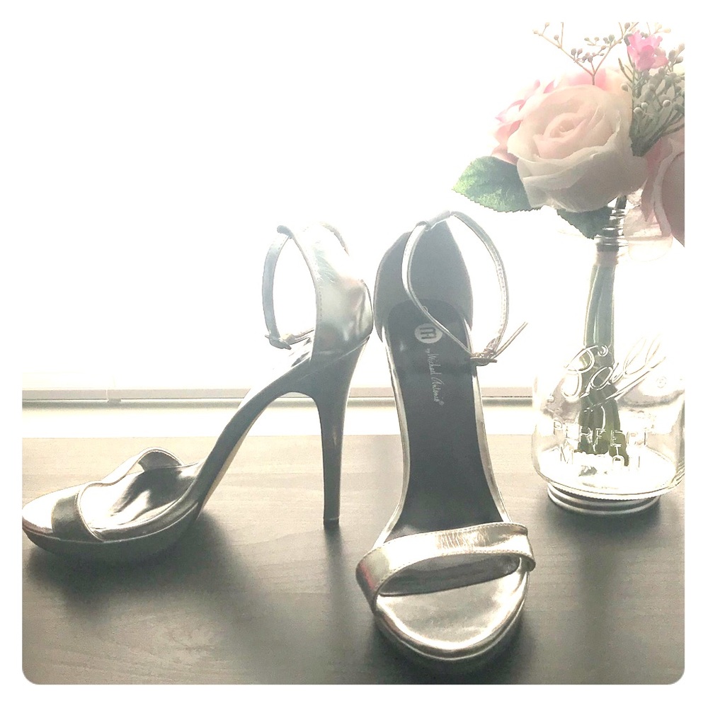 EUC strappy silver heels.  Worn twice 8.5